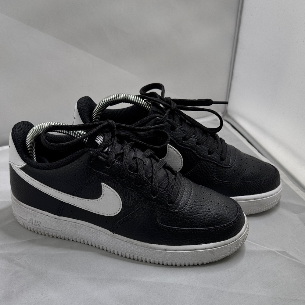 Big Kids Nike Air Force Ones. Black and White. Size 6 youth or women’s 7.5